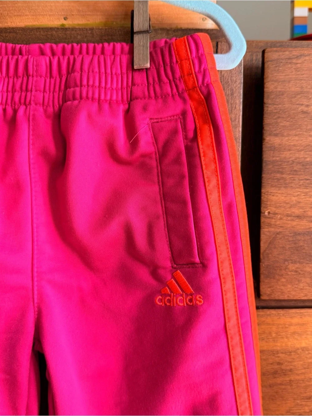 adidas Kids Bright Pink Lined Joggers with Orange Side Stripes
